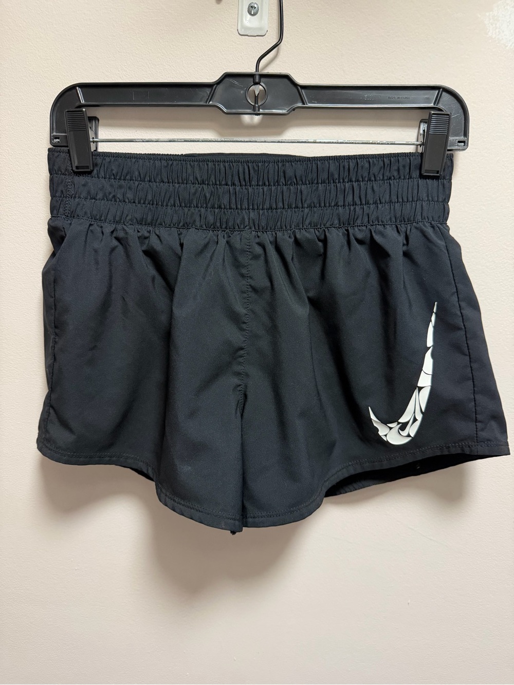 Nike Black Athletic Shorts with White Swoosh Accent